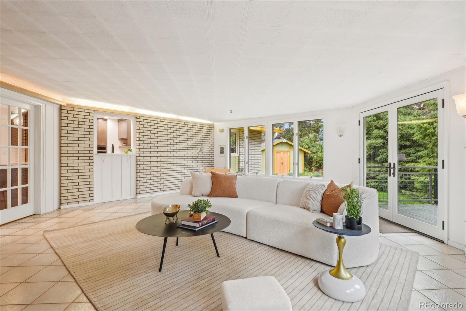 1118 Eagle Road Broomfield, CO 80020 - Photo 16 of 50 a living room with furniture and a large window