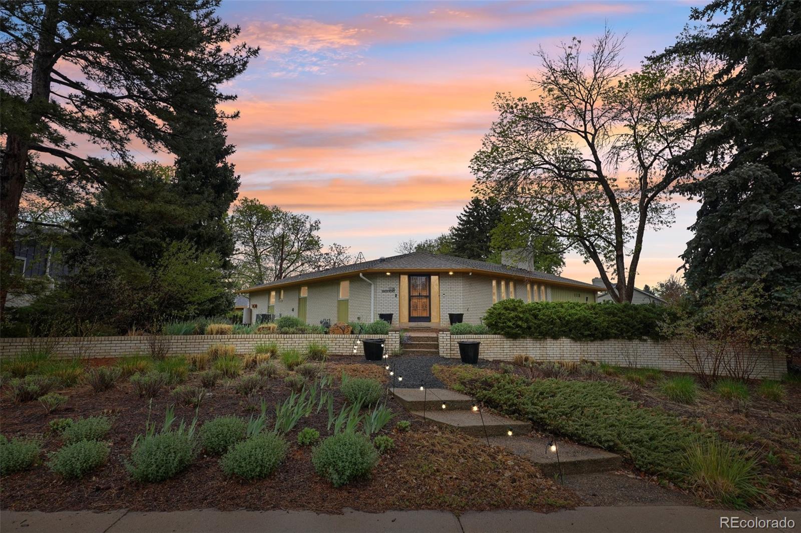 1118 Eagle Road Broomfield, CO 80020 - Photo 2 of 50 a backyard of a house with lots of green space