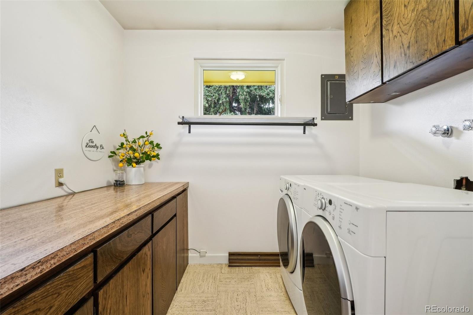 1118 Eagle Road Broomfield, CO 80020 - Photo 26 of 50 a utility room with dryer and washer