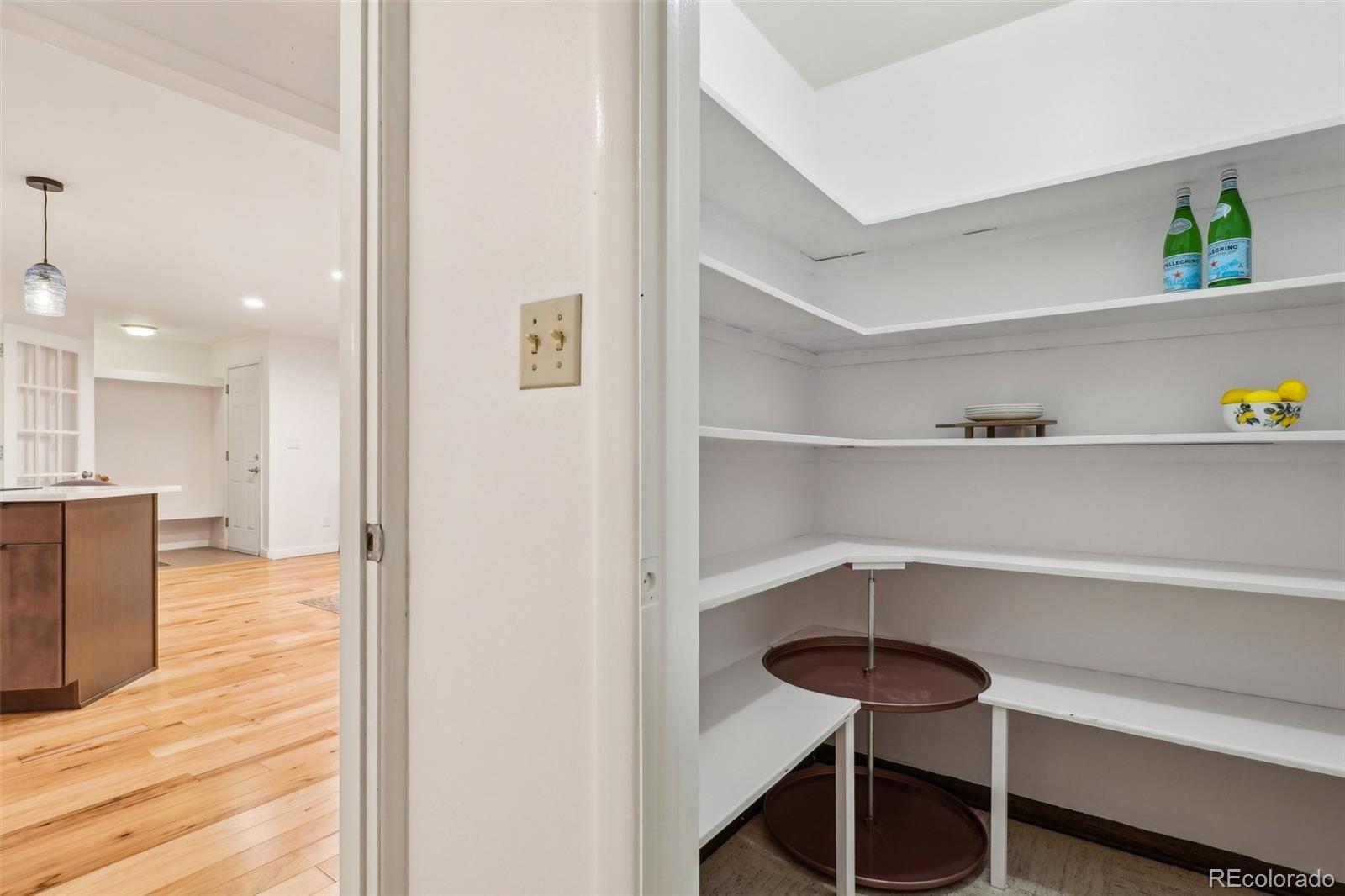 1118 Eagle Road Broomfield, CO 80020 - Photo 27 of 50 a view of a hallway with wooden floor and windows