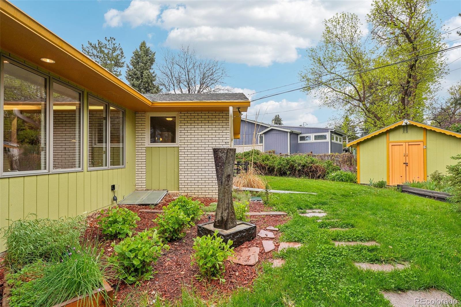 1118 Eagle Road Broomfield, CO 80020 - Photo 45 of 50 a front view of a house with garden