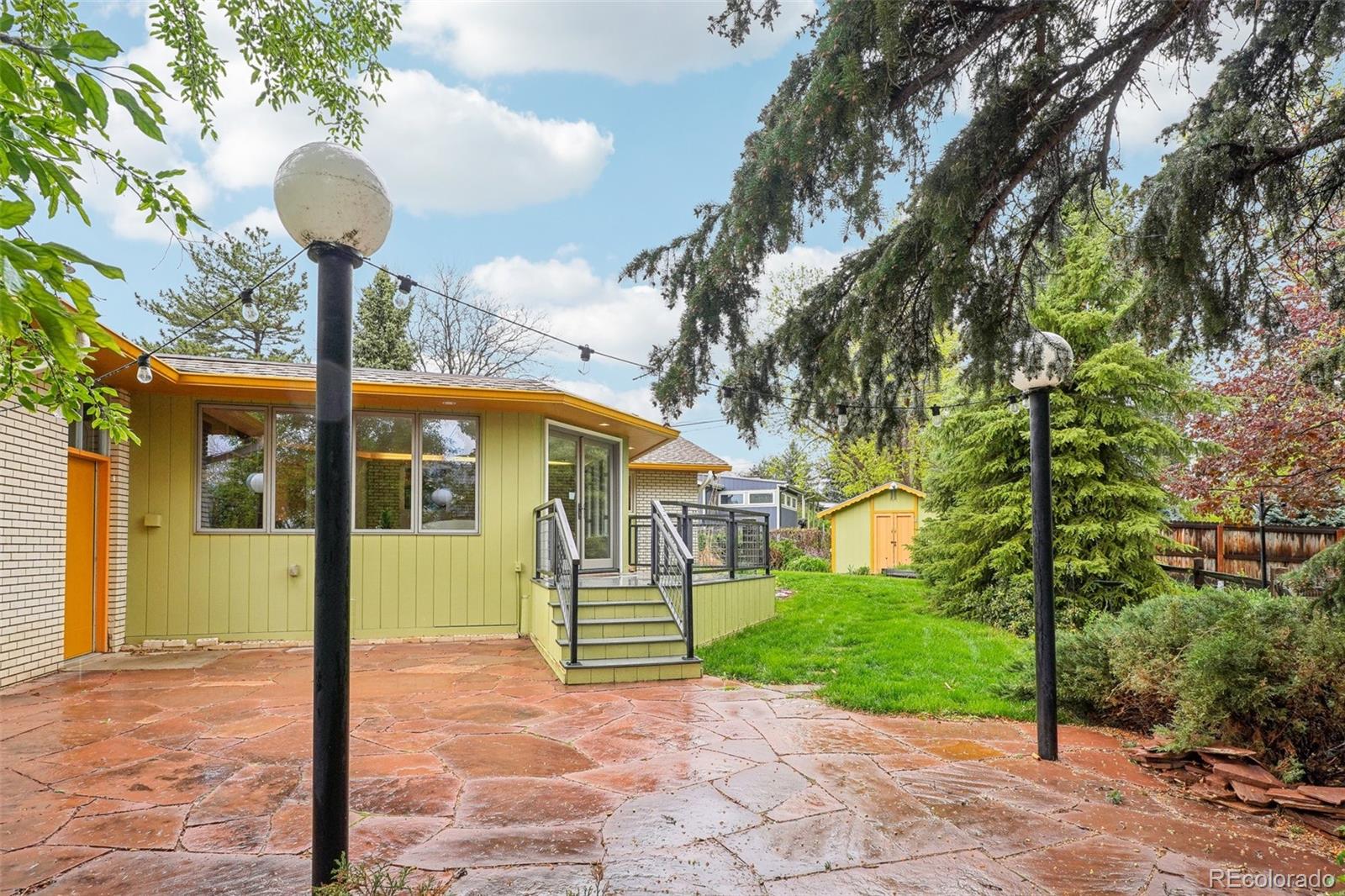 1118 Eagle Road Broomfield, CO 80020 - Photo 47 of 50 a front view of a house with garden and plants