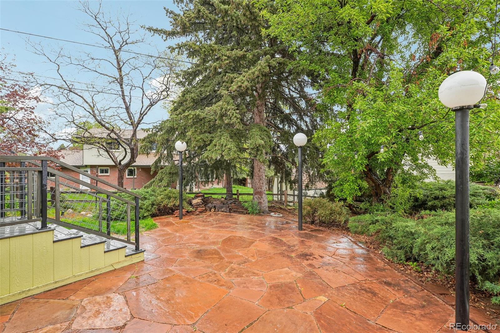 1118 Eagle Road Broomfield, CO 80020 - Photo 48 of 50 a view of a backyard with large trees