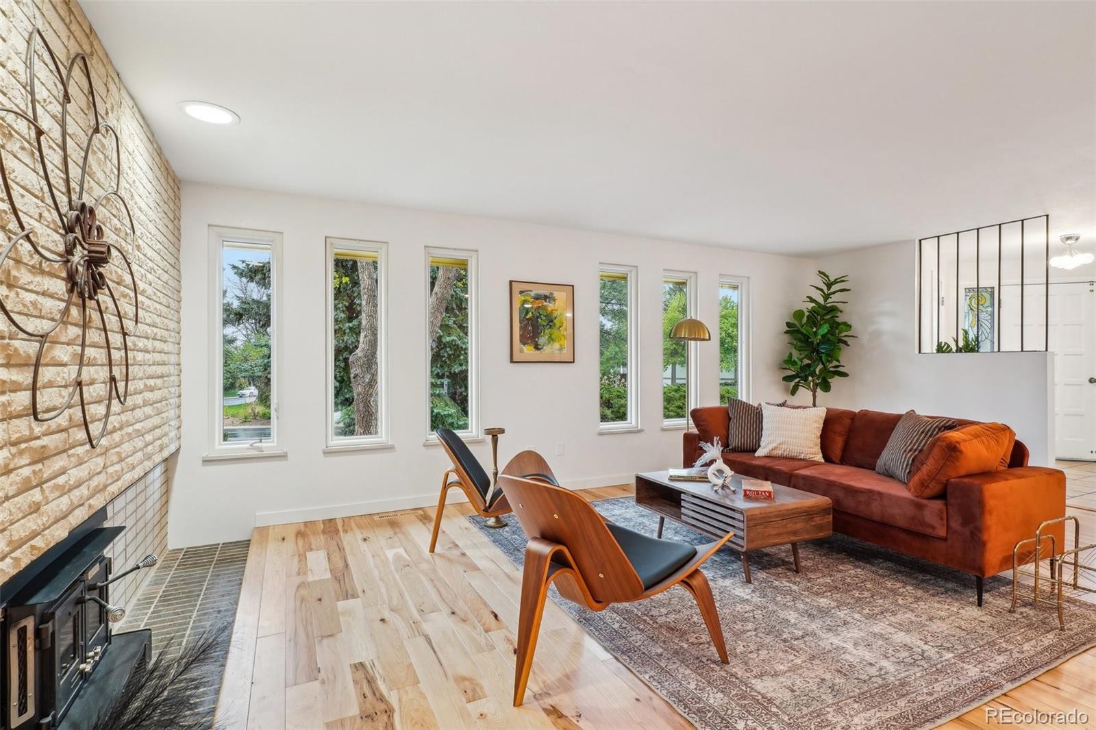 1118 Eagle Road Broomfield, CO 80020 - Photo 6 of 50 a living room with furniture and a large window