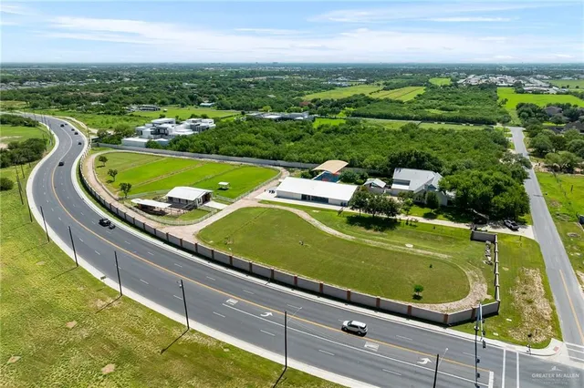 an aerial view of a tennis ground and a tennis court