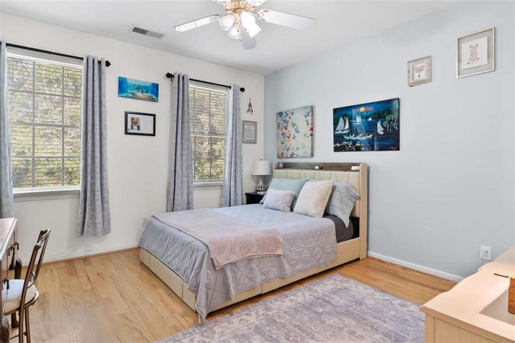 2055 Smyrna Road Southwest Conyers, GA 30094 - Photo 20 of 37 a bedroom with a bed and a window