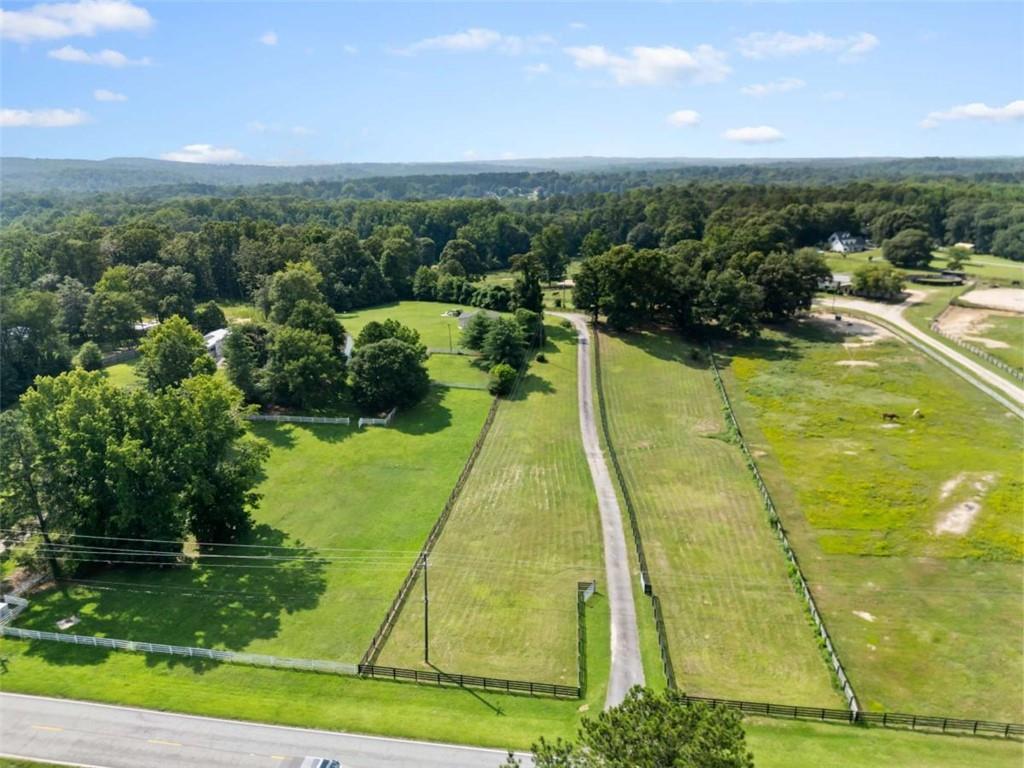 2055 Smyrna Road Southwest Conyers, GA 30094 - Photo 4 of 37 a view of a swimming pool with a yard