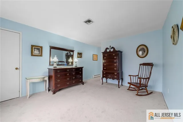 a view of a workspace with furniture