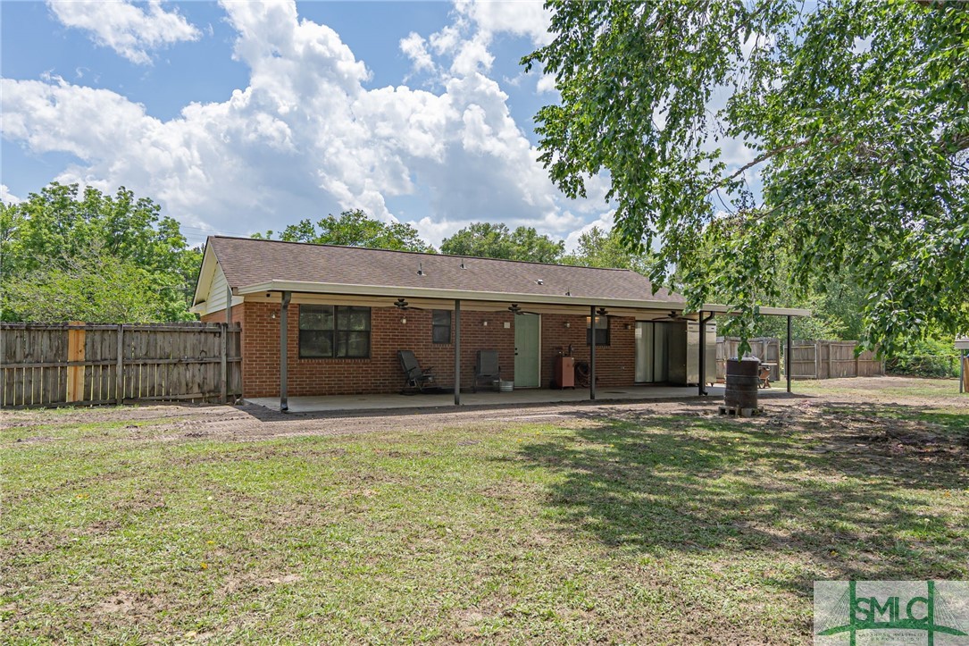 633 Roebling Road Bloomingdale, GA 31302 - Photo 31 of 33 From mid back yard to house