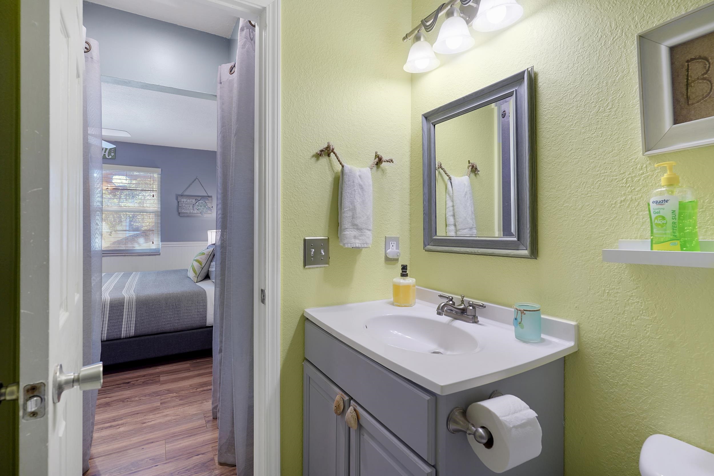 8 Clipper Court St. Augustine Beach, FL 32080 - Photo 15 of 27 a bathroom with a sink a toilet and shower
