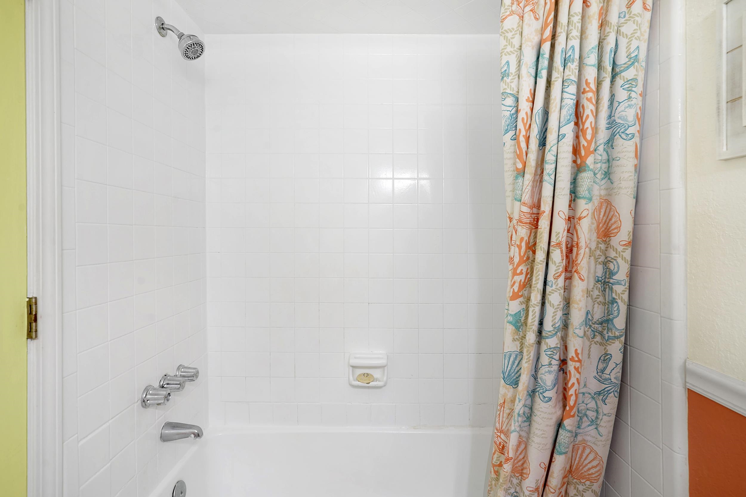 8 Clipper Court St. Augustine Beach, FL 32080 - Photo 20 of 27 a bathroom with a bathtub and shower