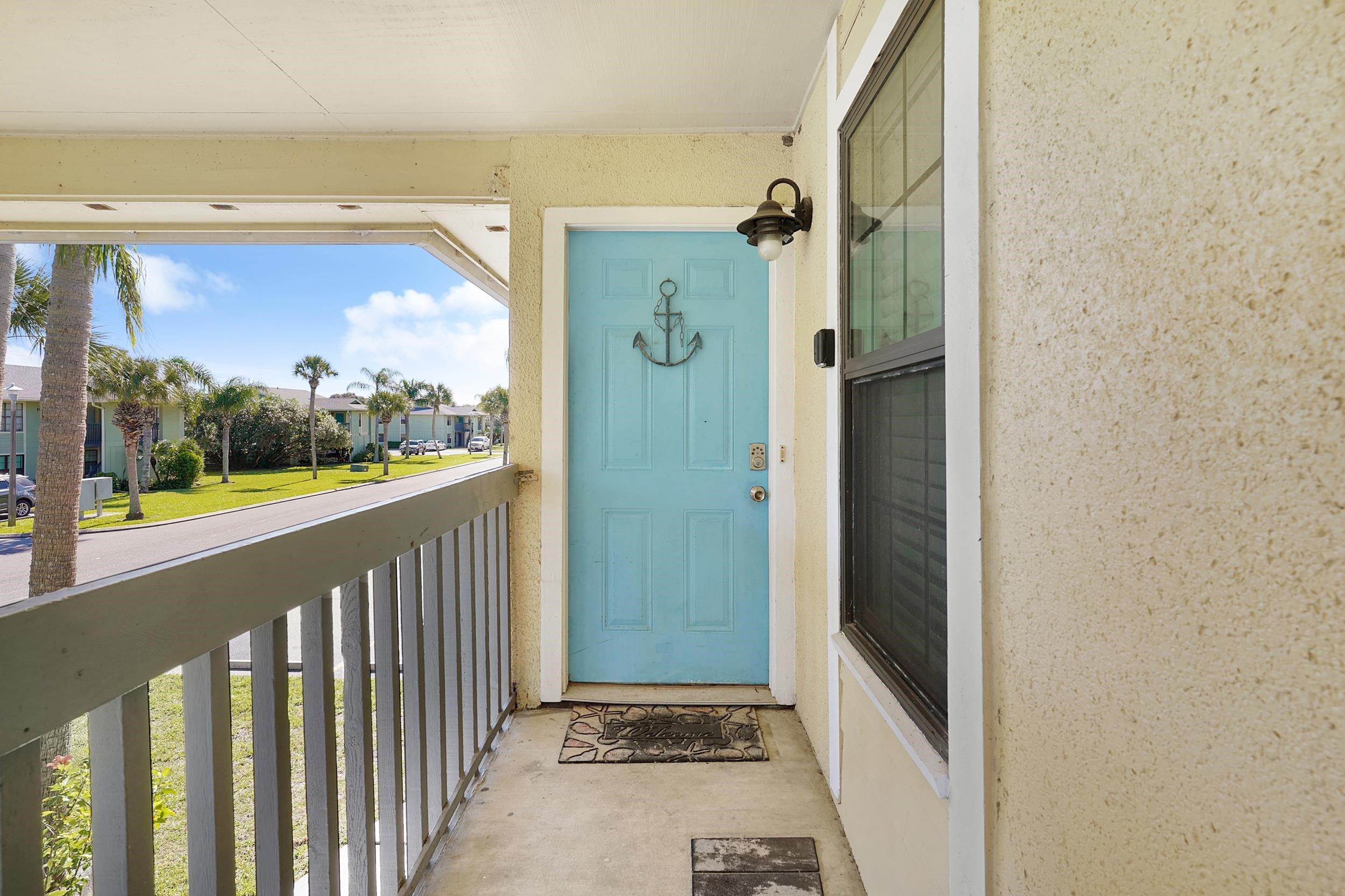 8 Clipper Court St. Augustine Beach, FL 32080 - Photo 2 of 27 a view of a door and a window