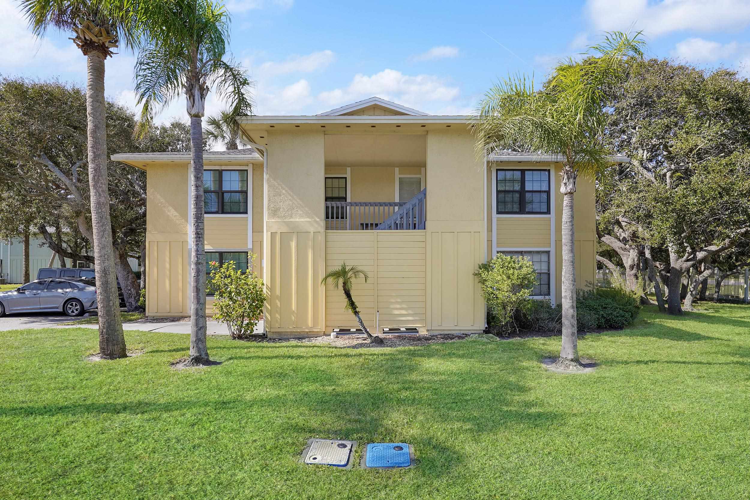 8 Clipper Court St. Augustine Beach, FL 32080 - Photo 21 of 27 front view of a house with a yard