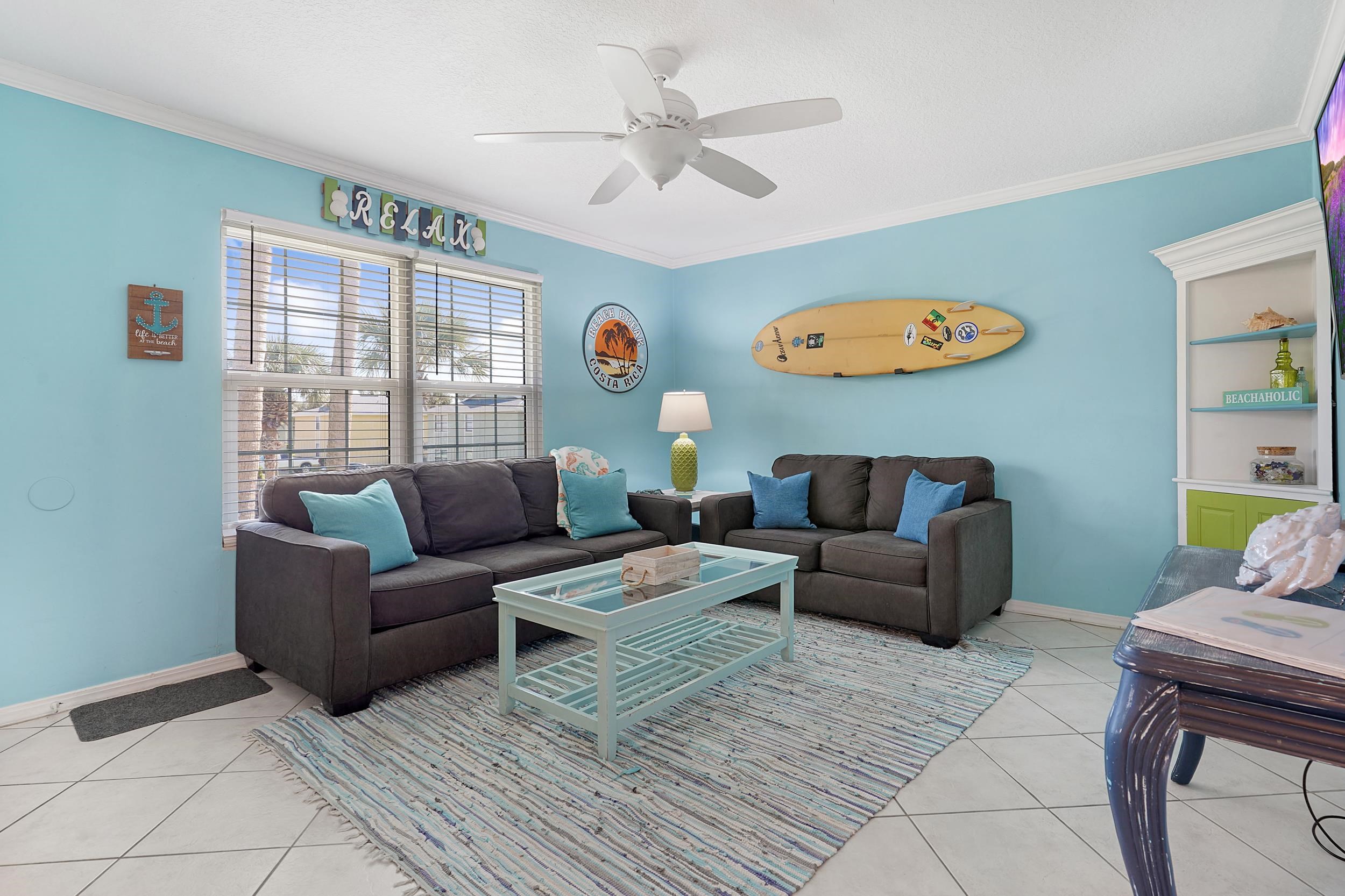 8 Clipper Court St. Augustine Beach, FL 32080 - Photo 3 of 27 a living room with furniture and a large window