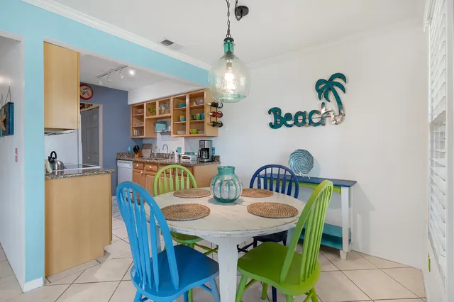 a view of a dining room with furniture