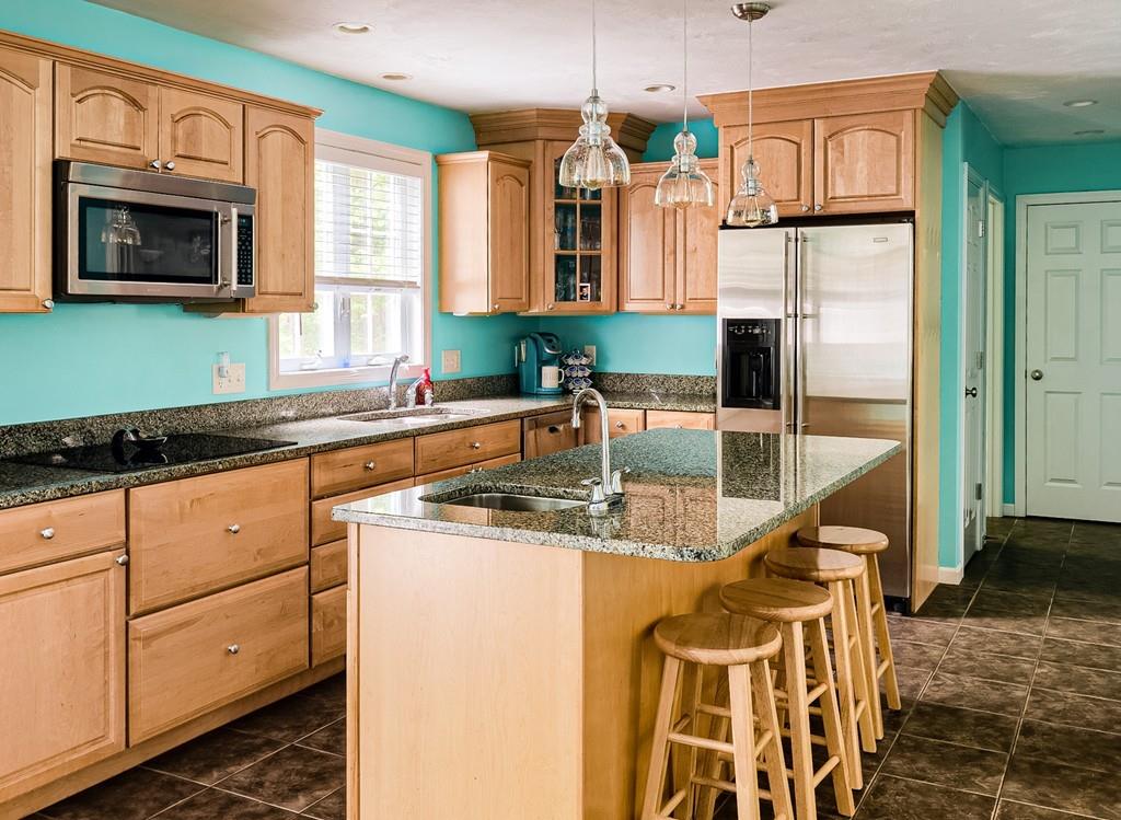 265 Pommogussett Road Rutland, MA 01543 - Photo 3 of 36 a kitchen with stainless steel appliances granite countertop a sink and a microwave