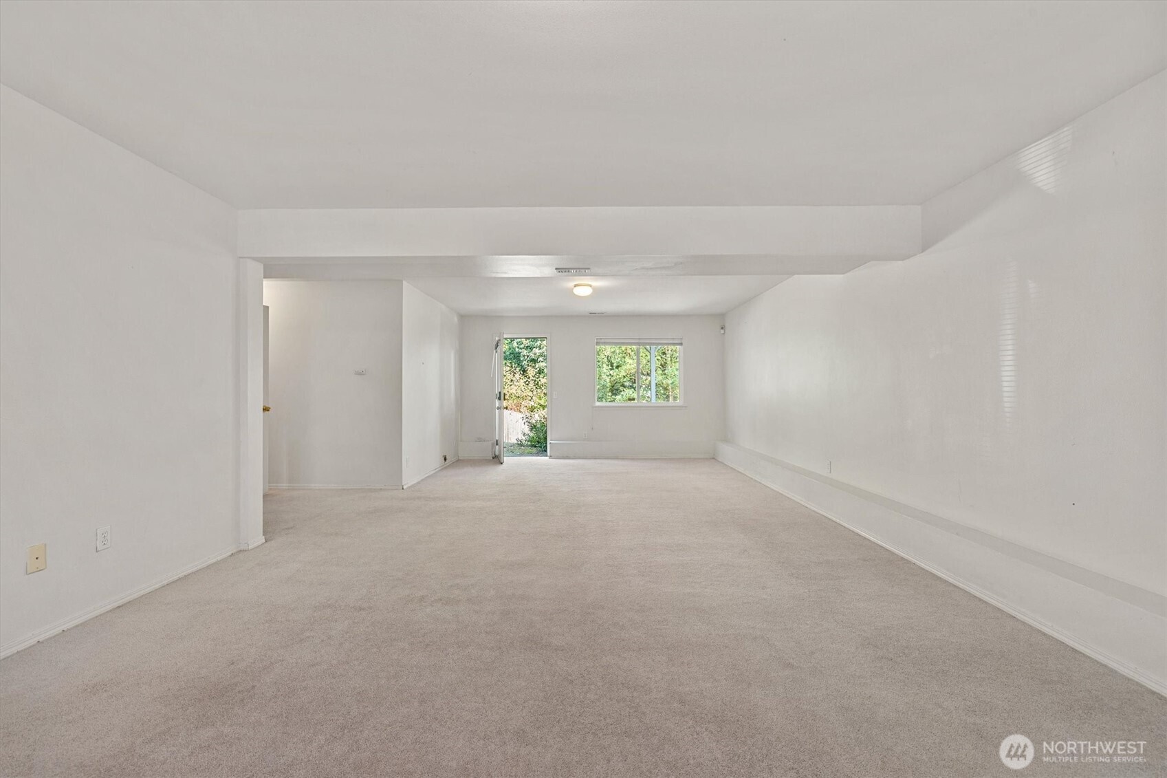 2320 Northeast 102nd Street Seattle, WA 98125 - Photo 14 of 19 a view of an empty room and a window