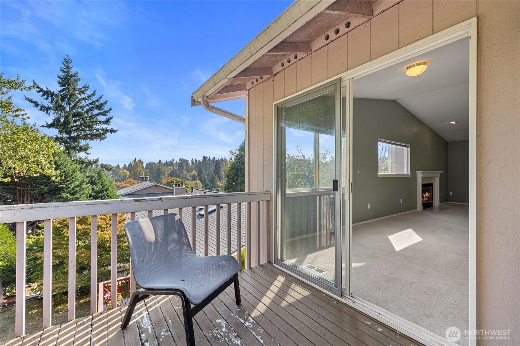 2320 Northeast 102nd Street Seattle, WA 98125 - Photo 5 of 19 a view of a balcony with chair and wooden floor