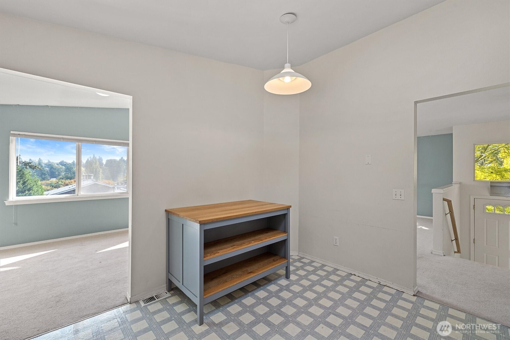 2320 Northeast 102nd Street Seattle, WA 98125 - Photo 9 of 19 a view of room with window and a ceiling fan