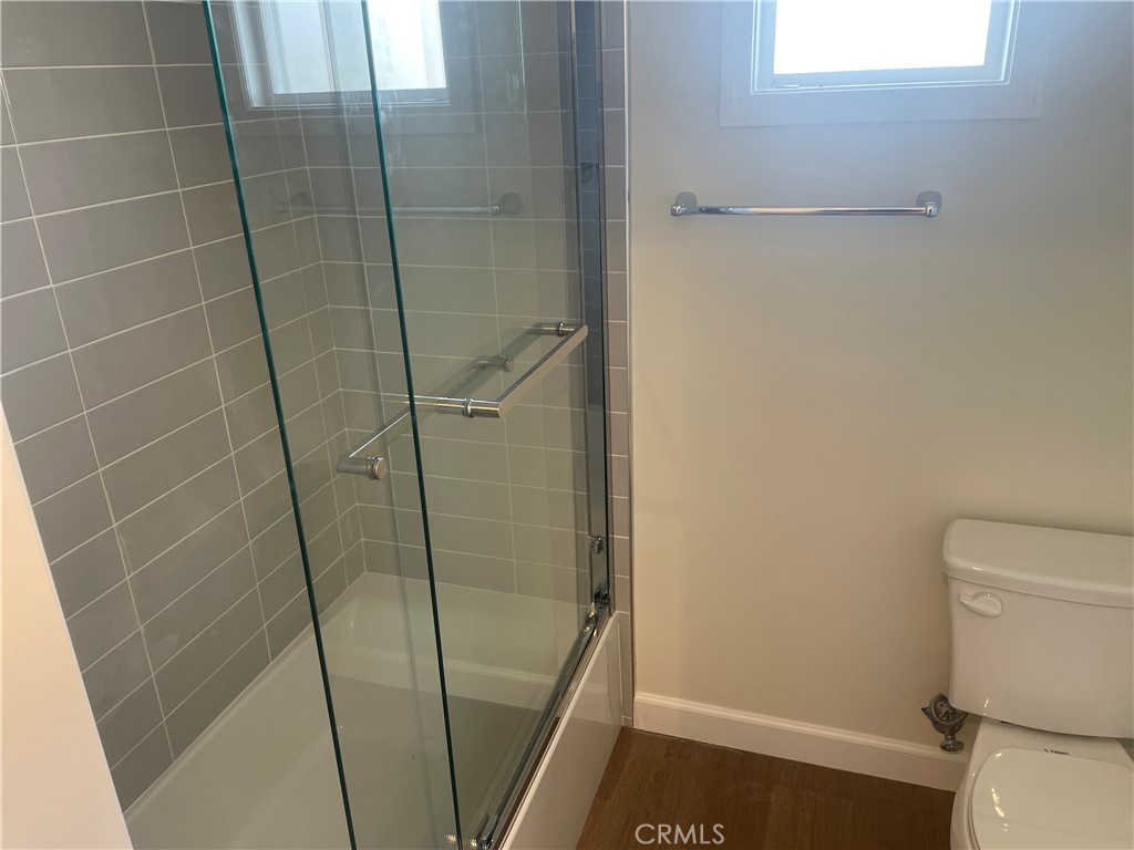 425 West Duarte Road, Unit 411B Monrovia, CA 91016 - Photo 29 of 34 a bathroom with a shower and toilet