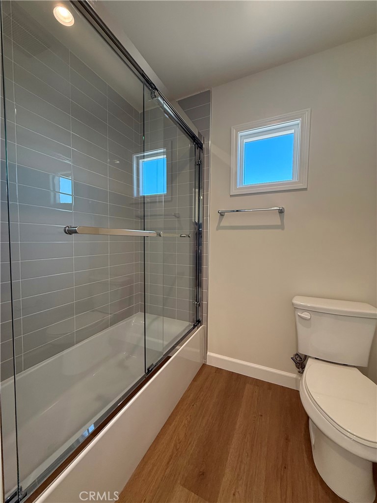 425 West Duarte Road, Unit 411B Monrovia, CA 91016 - Photo 10 of 34 a bathroom with a toilet and a shower