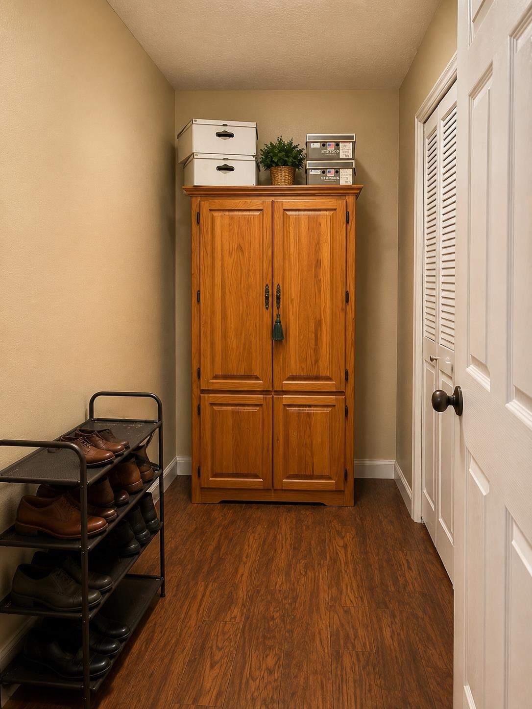 5845 Meadowview Road Beaumont, TX 77708 - Photo 23 of 24 a view of a utility room with closet and wooden floor