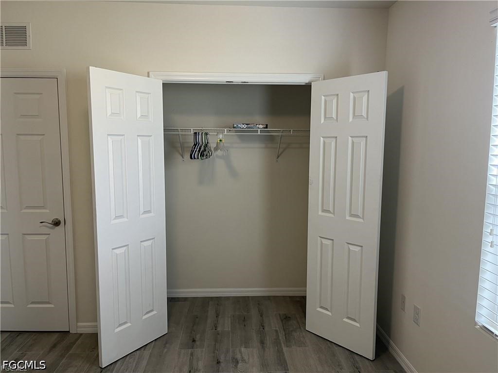 8187 Gopher Tortoise Trail Lehigh Acres, FL 33972 - Photo 12 of 23 a view of a walk in closet