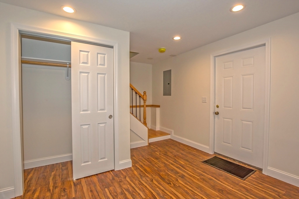 165 Sandisfield Road Sandisfield, MA 01255 - Photo 5 of 37 a view of empty room with wooden floor