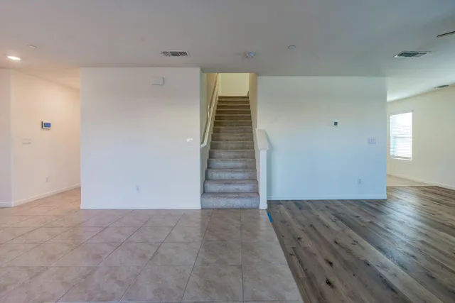 a bathroom with a shower a toilet and sink