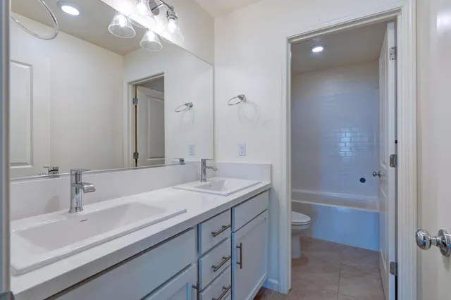 a view of a wrought iron fences in front of house