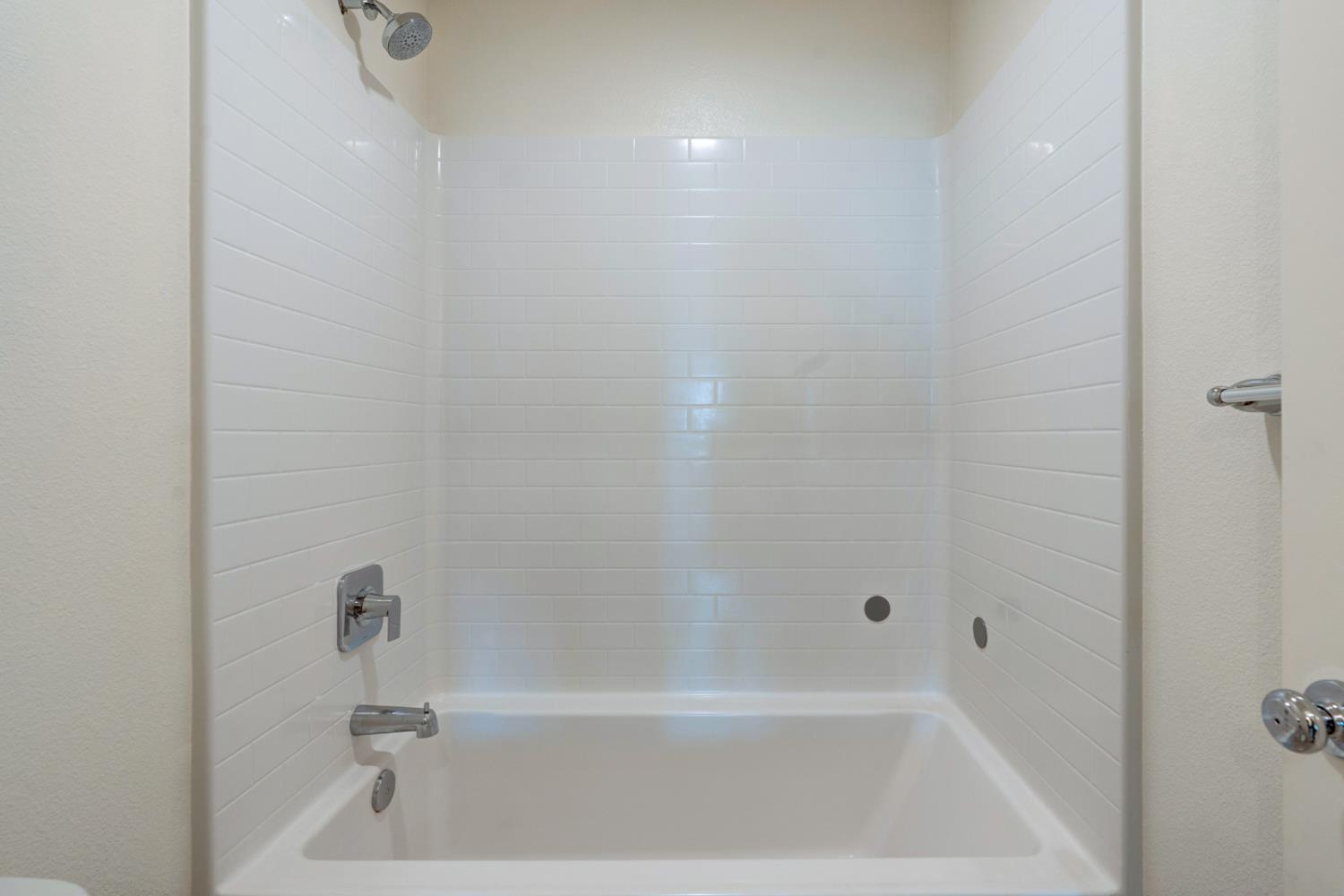 753 Heitz Way Merced, CA 95348 - Photo 45 of 70 a bathroom with a bathtub