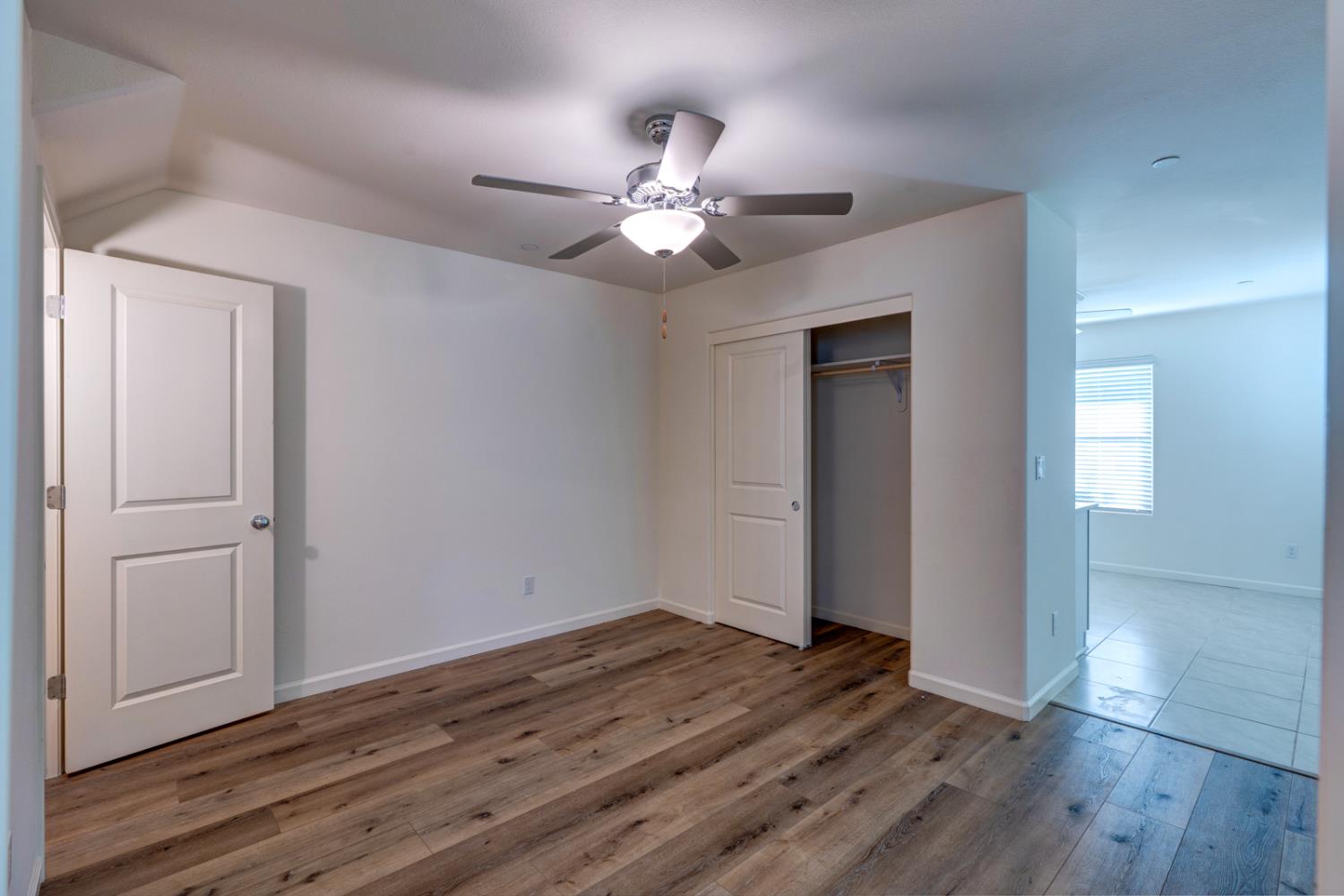 753 Heitz Way Merced, CA 95348 - Photo 9 of 70 a view of empty room with wooden floor