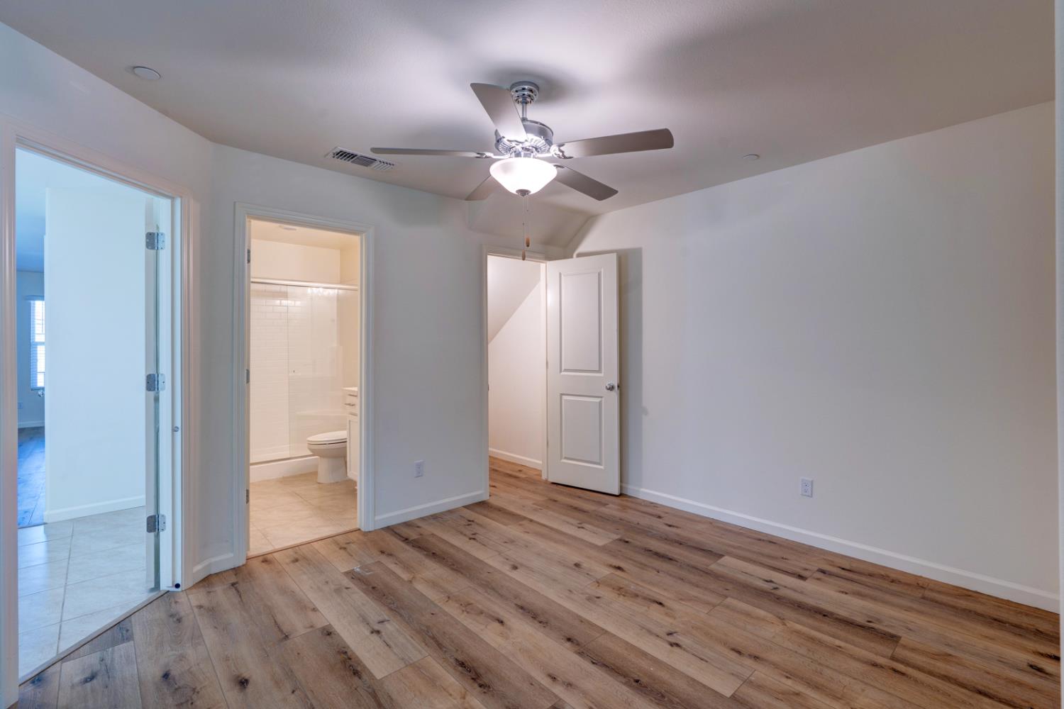 753 Heitz Way Merced, CA 95348 - Photo 10 of 70 a view of empty room with wooden floor