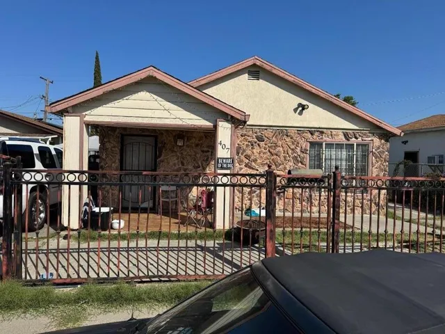 a front view of a house with deck