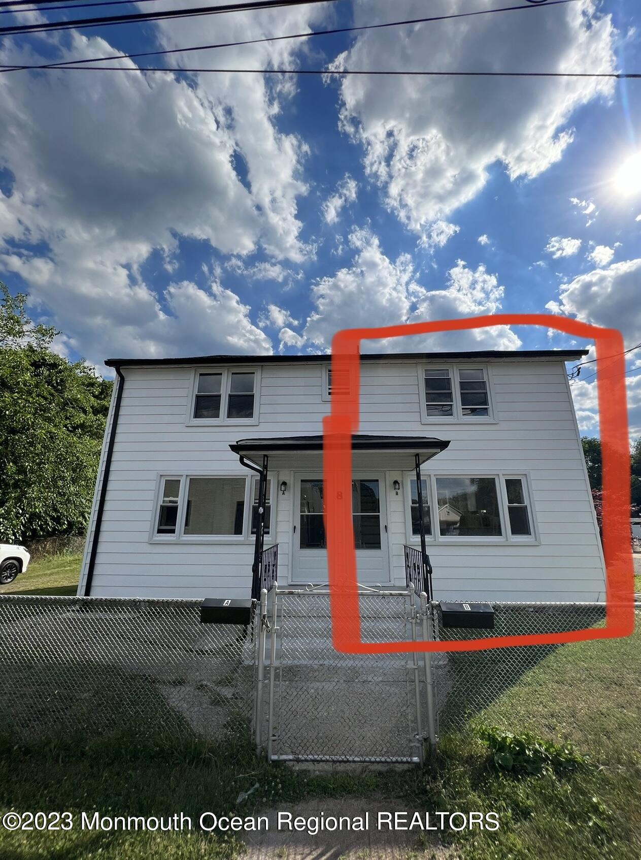 a front view of house with yard