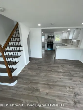 a view of kitchen with furniture and window
