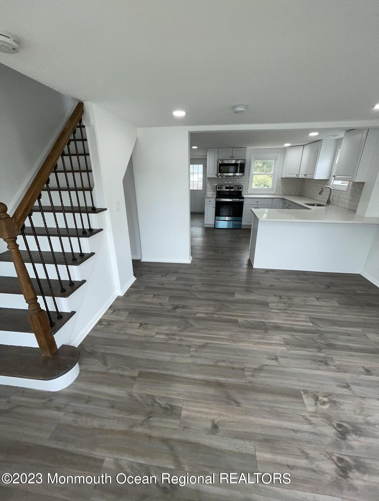 8a Washington Avenue, Unit B Matawan, NJ 07747 - Photo 5 of 16 a view of kitchen with furniture and window