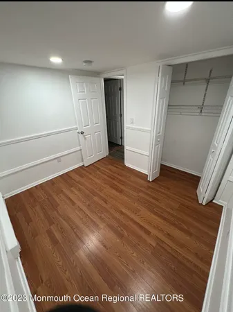 a bathroom with a sink a mirror and tub