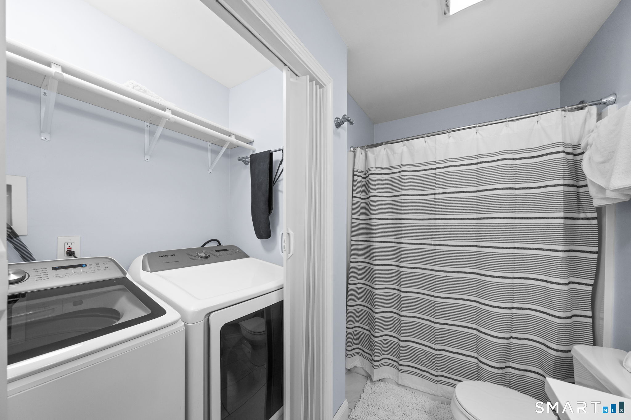 1118 Spindle Hill Road Wolcott, CT 06716 - Photo 23 of 38 a bathroom with a sink toilet and shower