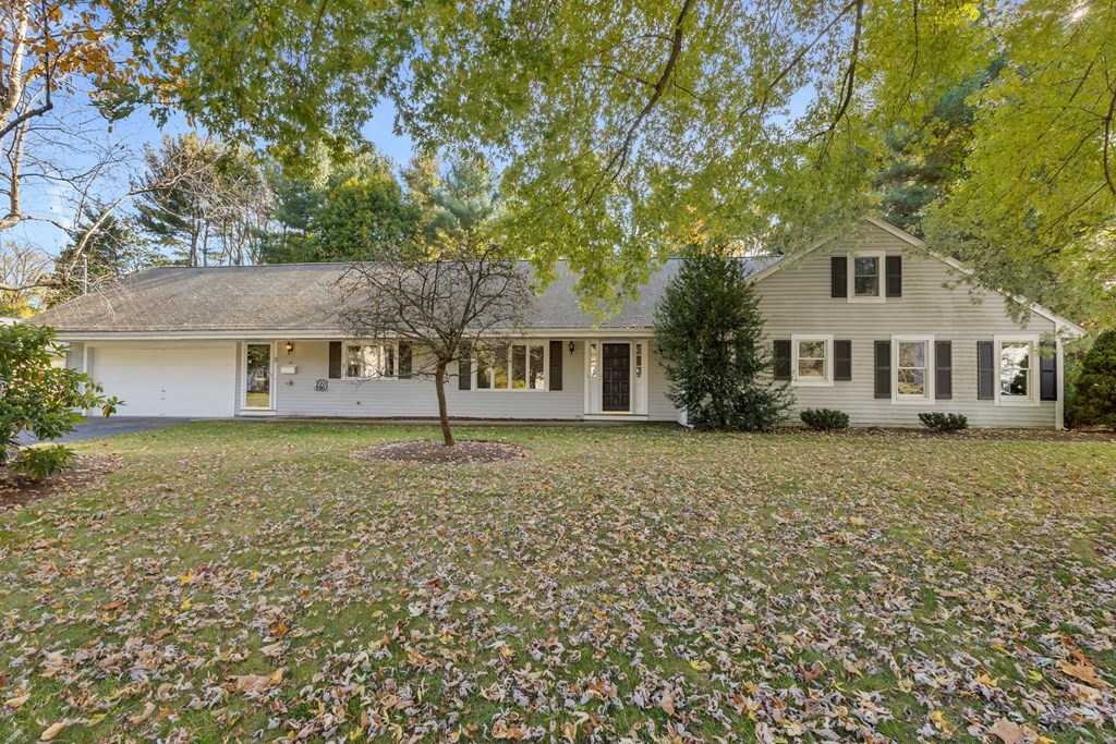 10 Pine Grove Road Hingham, MA 02043 - Photo 1 of 27 a front view of a house with a garden