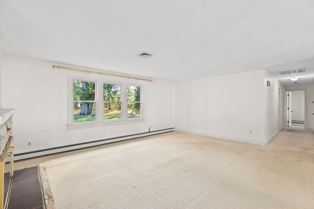 10 Pine Grove Road Hingham, MA 02043 - Photo 12 of 27 an empty room with windows