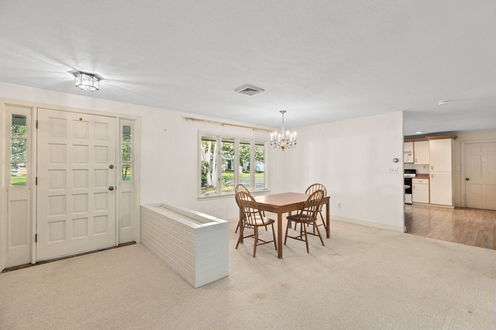 10 Pine Grove Road Hingham, MA 02043 - Photo 14 of 27 a view of a livingroom with furniture and cabinet