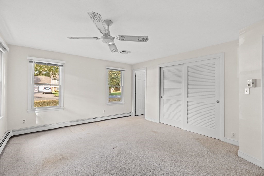 10 Pine Grove Road Hingham, MA 02043 - Photo 16 of 27 a view of an empty room with a window