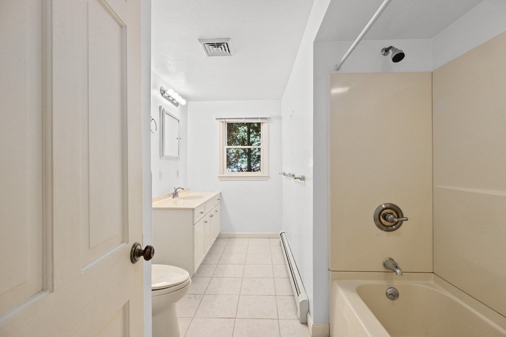 10 Pine Grove Road Hingham, MA 02043 - Photo 21 of 27 a bathroom with a tub a sink and a shower