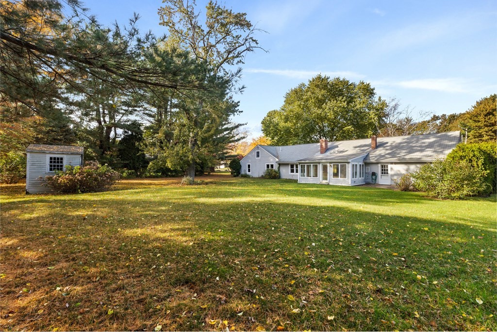10 Pine Grove Road Hingham, MA 02043 - Photo 24 of 27 a view of a house with a yard