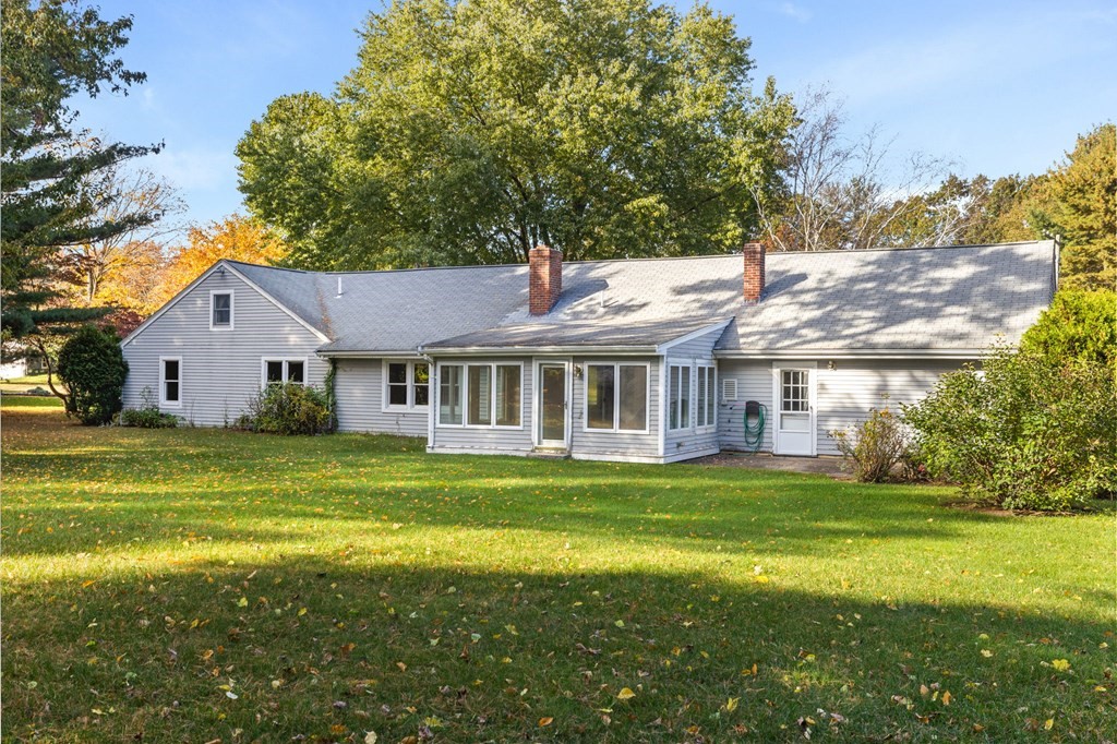 10 Pine Grove Road Hingham, MA 02043 - Photo 25 of 27 a front view of house with yard and green space