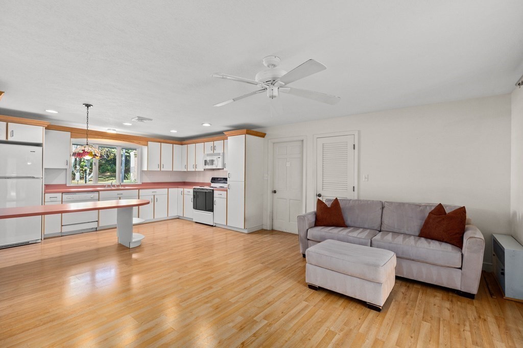 10 Pine Grove Road Hingham, MA 02043 - Photo 5 of 27 a living room with furniture and a wooden floor