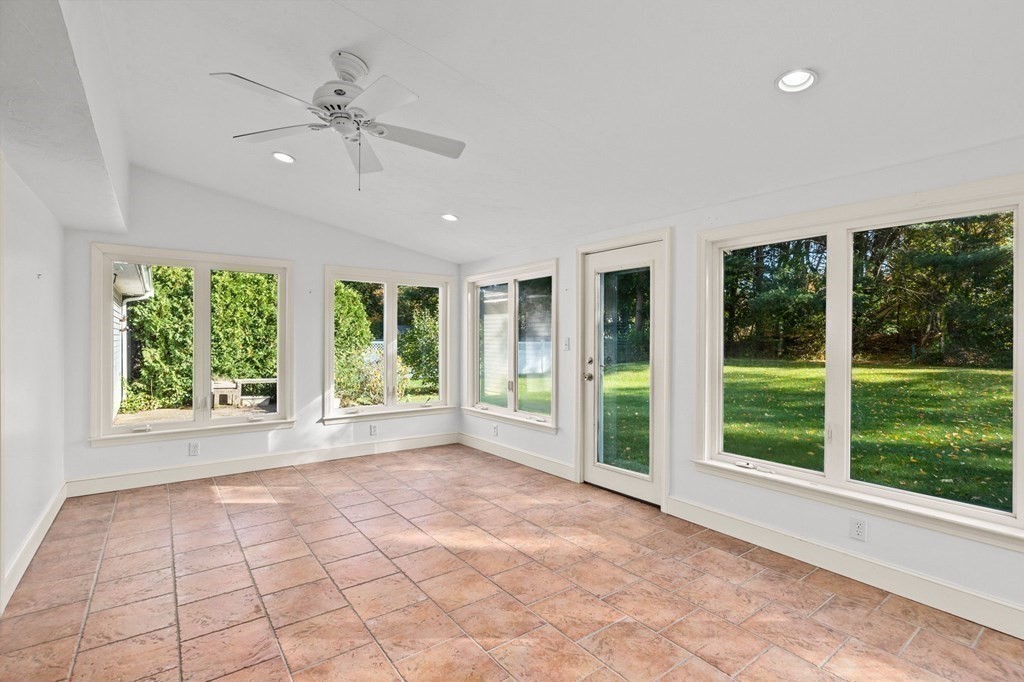 10 Pine Grove Road Hingham, MA 02043 - Photo 8 of 27 a view of an empty room with wooden floor and a large window