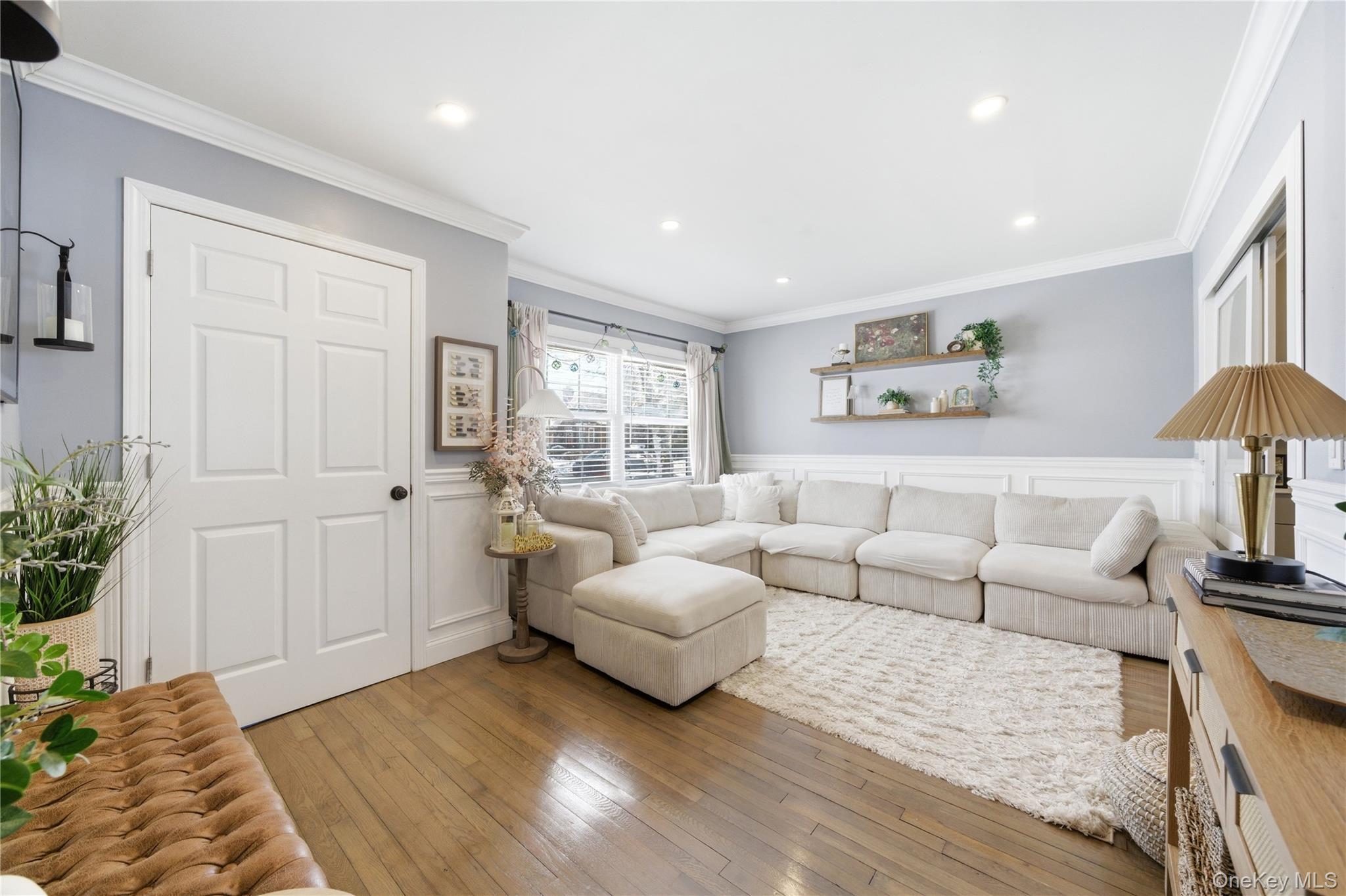 192 Mill Road Valley Stream, NY 11581 - Photo 20 of 26 a living room with furniture and a window