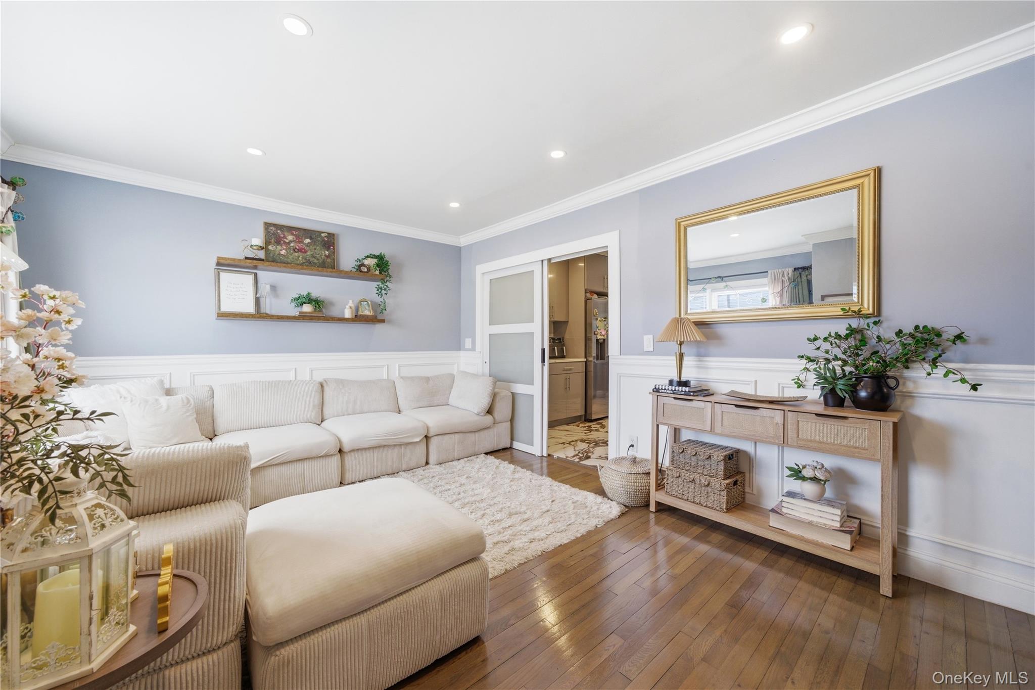 192 Mill Road Valley Stream, NY 11581 - Photo 21 of 26 a living room with furniture and a fireplace